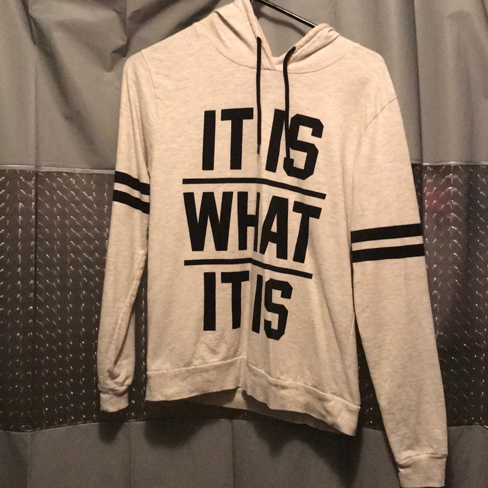 A black with faded silver color long sleeve shirt